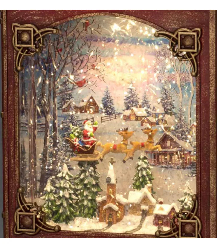 livre_de_nol_lanterne__neige_pre_nol_dans_un_traineau_1.webp Konstsmide, guirlandes lumineuses de Noël Livre De Noël Lanterne À Neige, Père Noël Dans Un Traineau