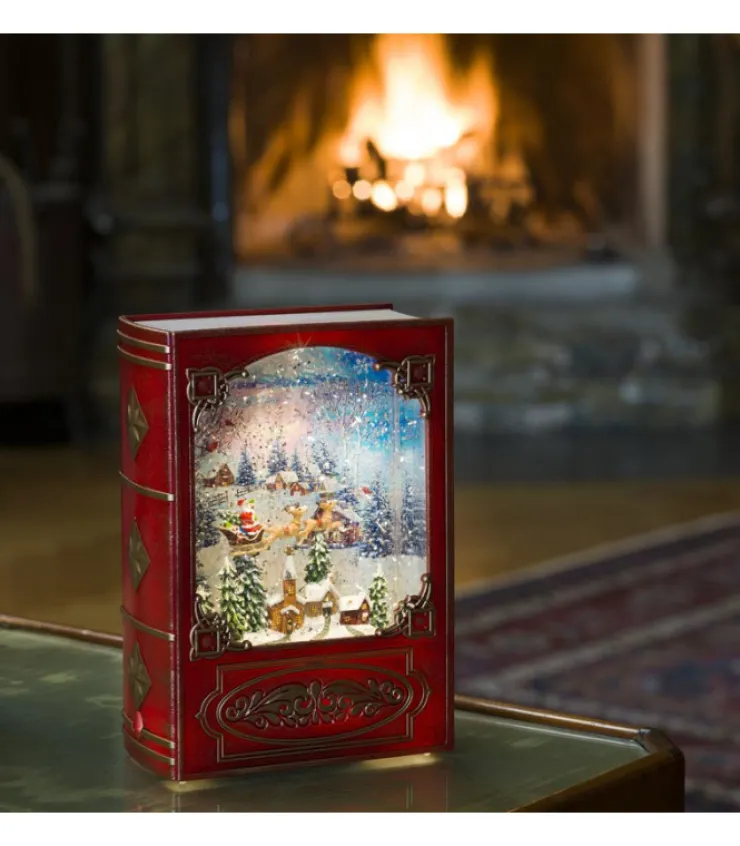 livre_de_nol_lanterne__neige_pre_nol_dans_un_traineau_2.webp Konstsmide, guirlandes lumineuses de Noël Livre De Noël Lanterne À Neige, Père Noël Dans Un Traineau